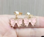 Øreringe - Clips øreringe med små lyserøde sløjfer